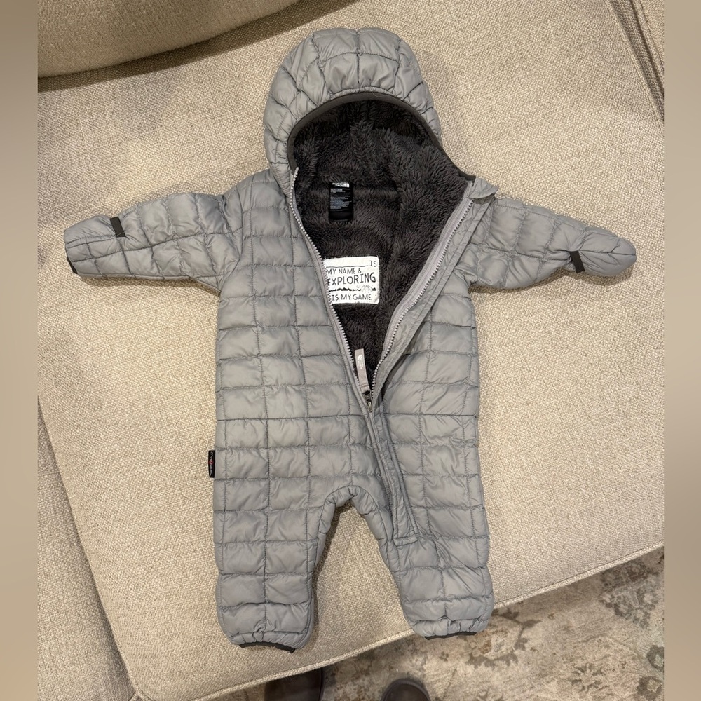 The North Face Light Gray One Piece Snowsuit with Quilted Design and Hood
